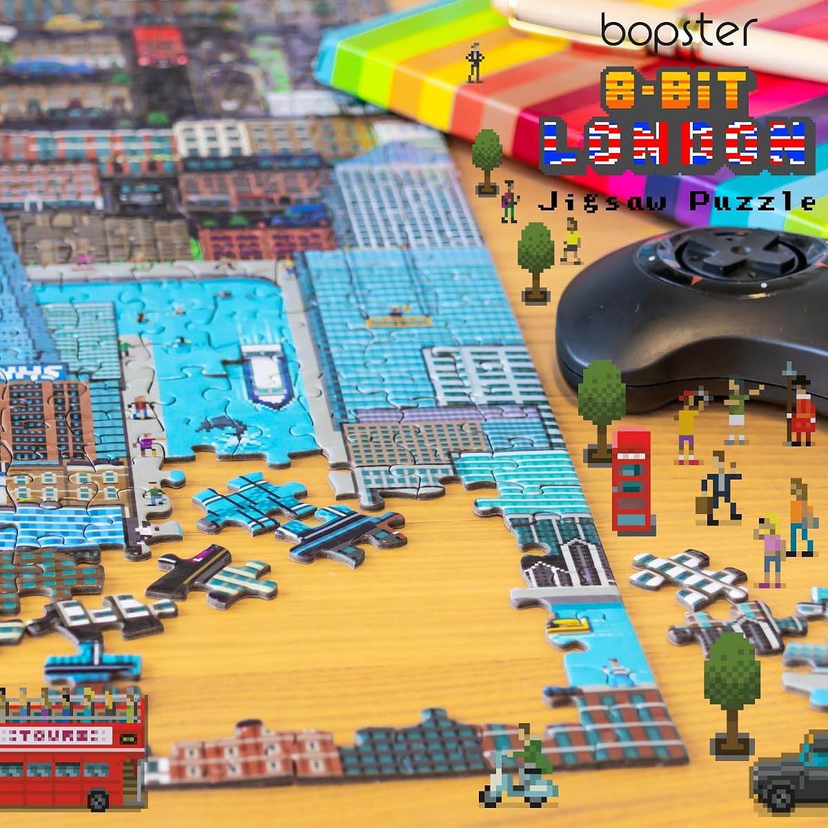 bopster 8-Bit London Puzzle — 1000 Pieces next to its box