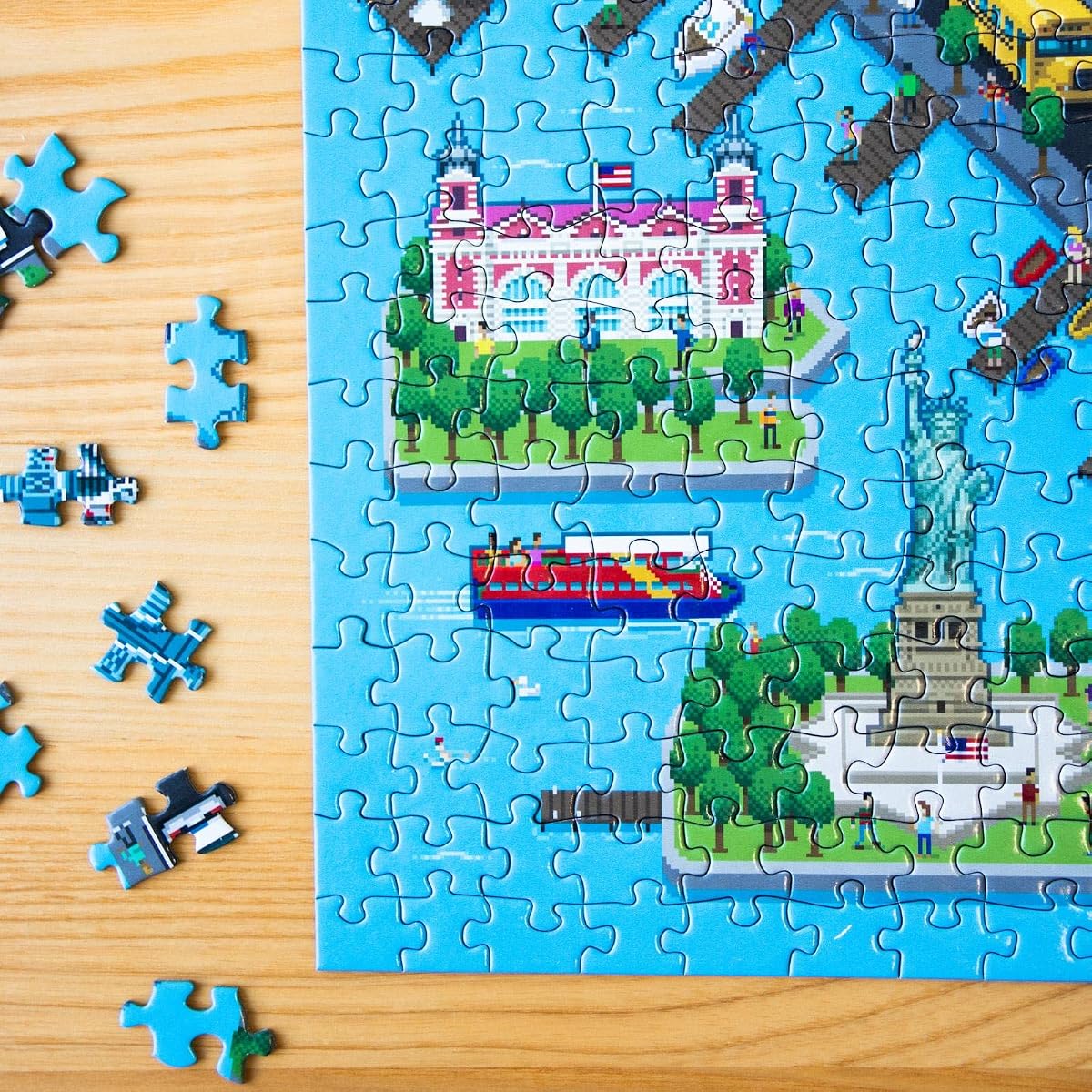 bopster 8-Bit New York Puzzle — 1000 Pieces next to its box